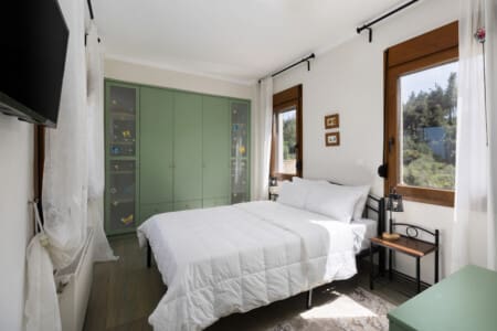 Frida & Rosa villas in Kripogi offering modern two-level holiday homes with private gardens and comfortable living spaces for a relaxing getaway in Halkidiki.