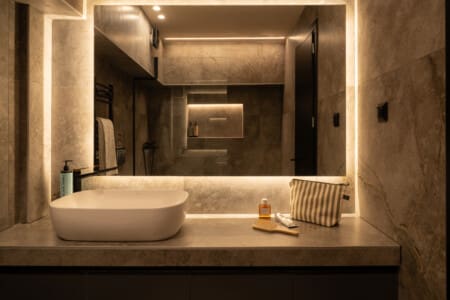 Dry Martini two-bedroom apartment in the city center with premium amenities, two bathrooms, stylish living room, and private balcony for a comfortable stay in Thessaloniki.