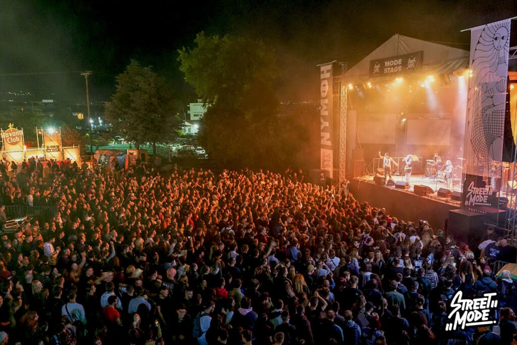 Large audience gathered in front of the main stage at Street Mode Festival.